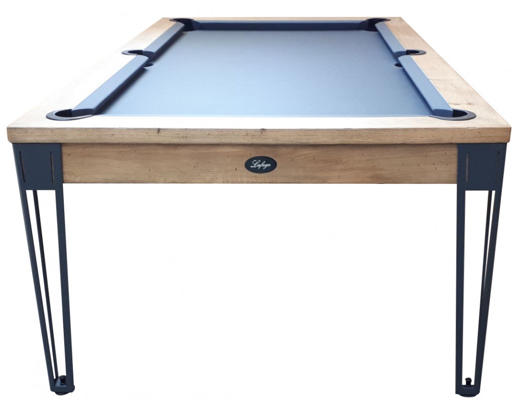 Table de billard transformable en table à manger avec plateau bleu et pieds fins en métal noir.